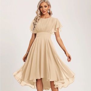 Sized 14 New with tags JJ house bridesmaid dress champagne